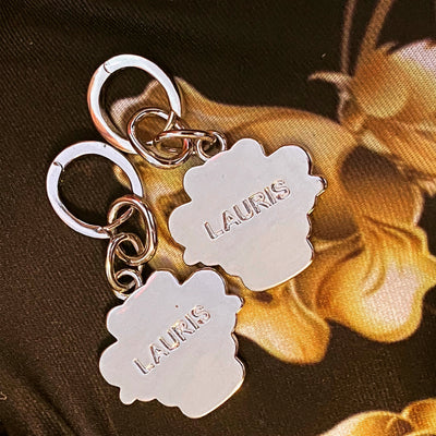 Lauris Couture White Gold Logo Earrings